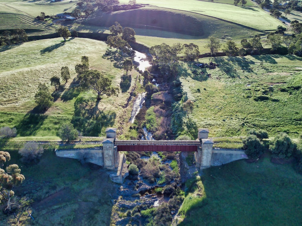 an aerial view of a bridge over a river