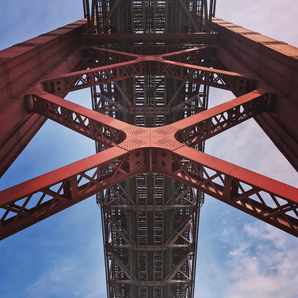 a very tall metal structure with a sky in the background