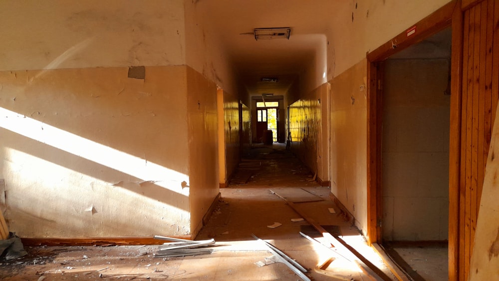 a long hallway in an abandoned building