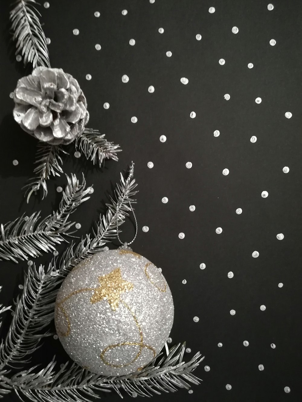 a christmas ornament hanging from a christmas tree