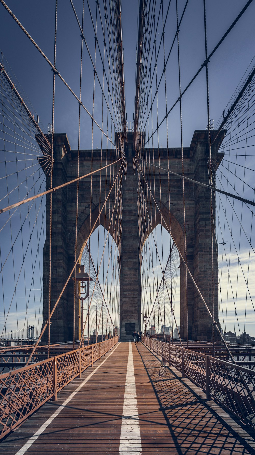 a view of the brooklyn bridge from the ground