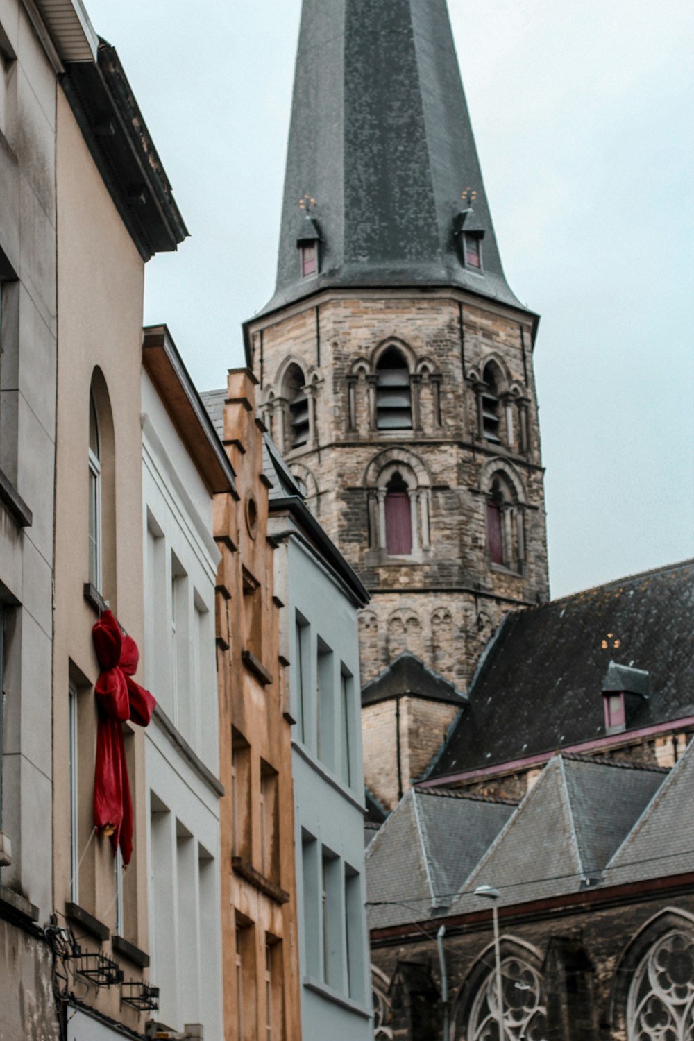 a tall tower with a clock on it's side