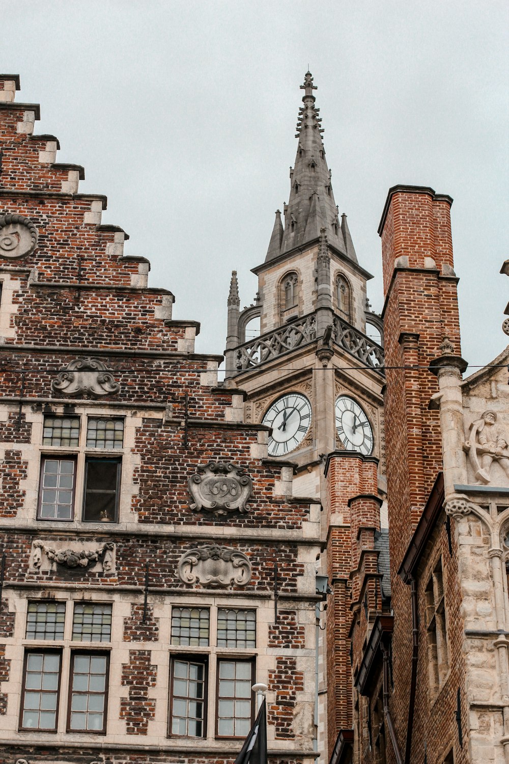 a tall building with a clock on it's side