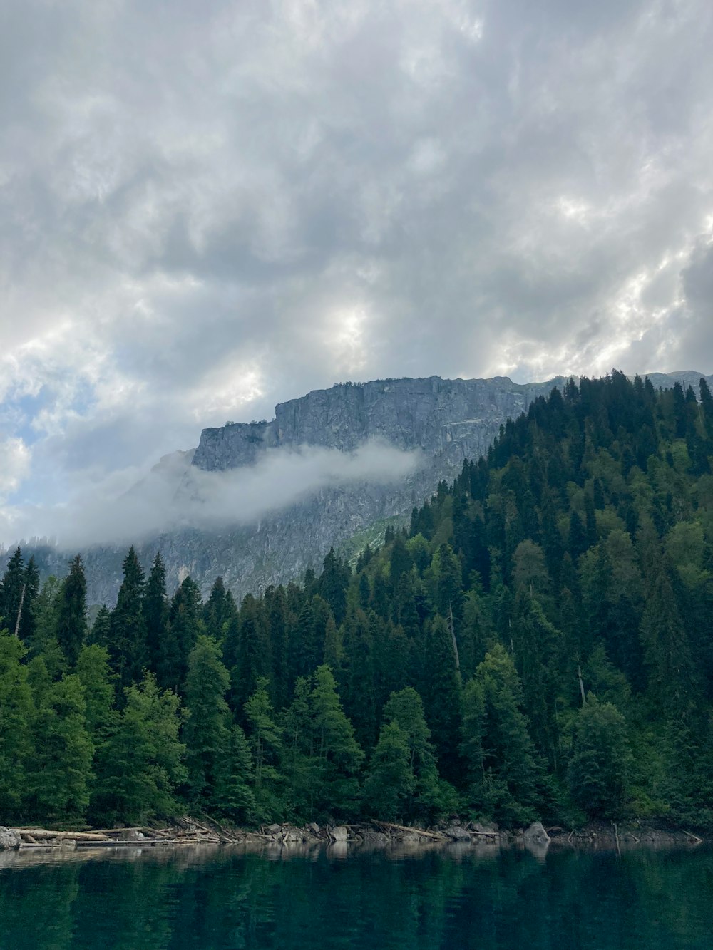 a lake with a mountain in the background