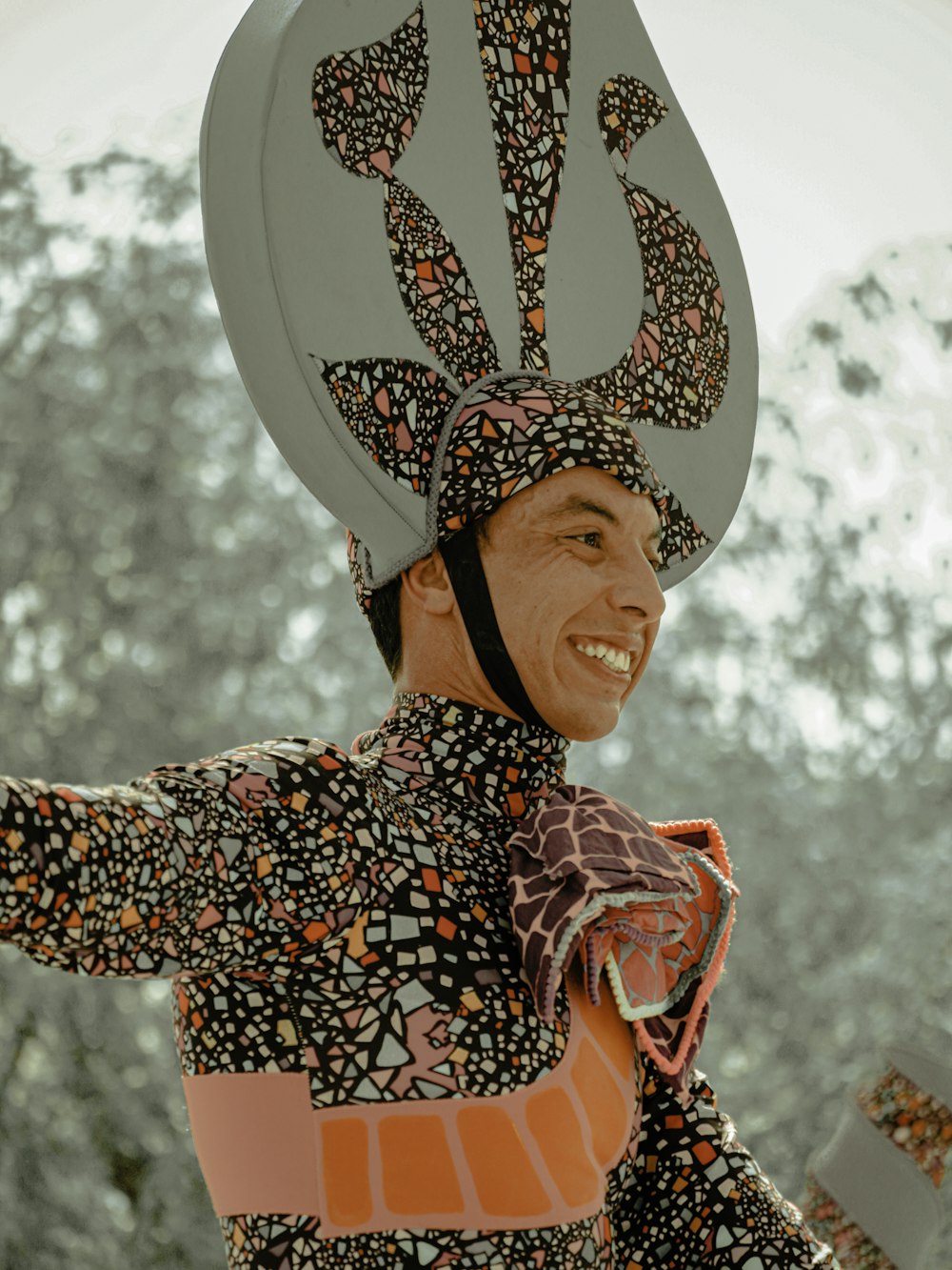 a man in a costume with a hat on his head