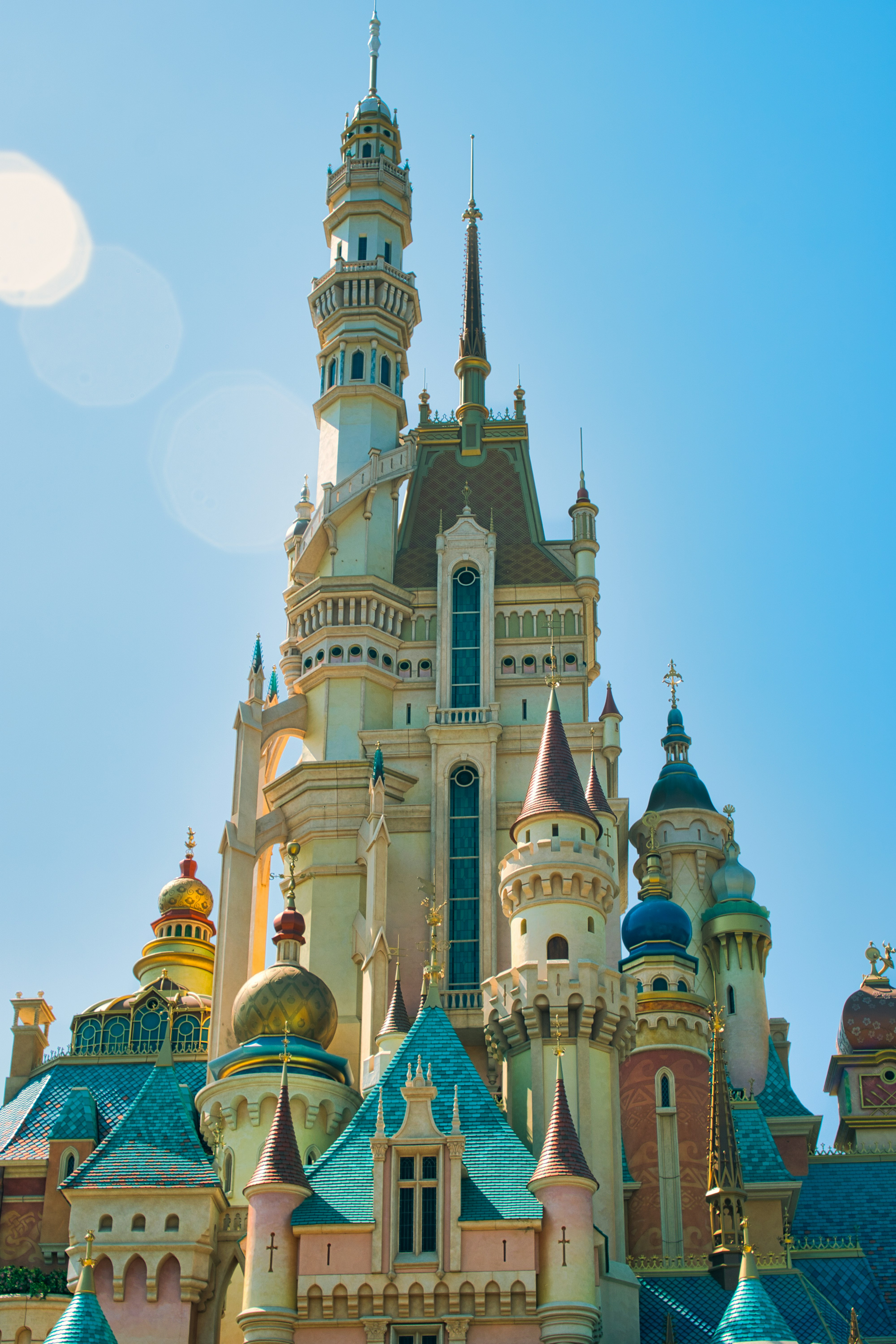 a very tall building with a clock on it's side