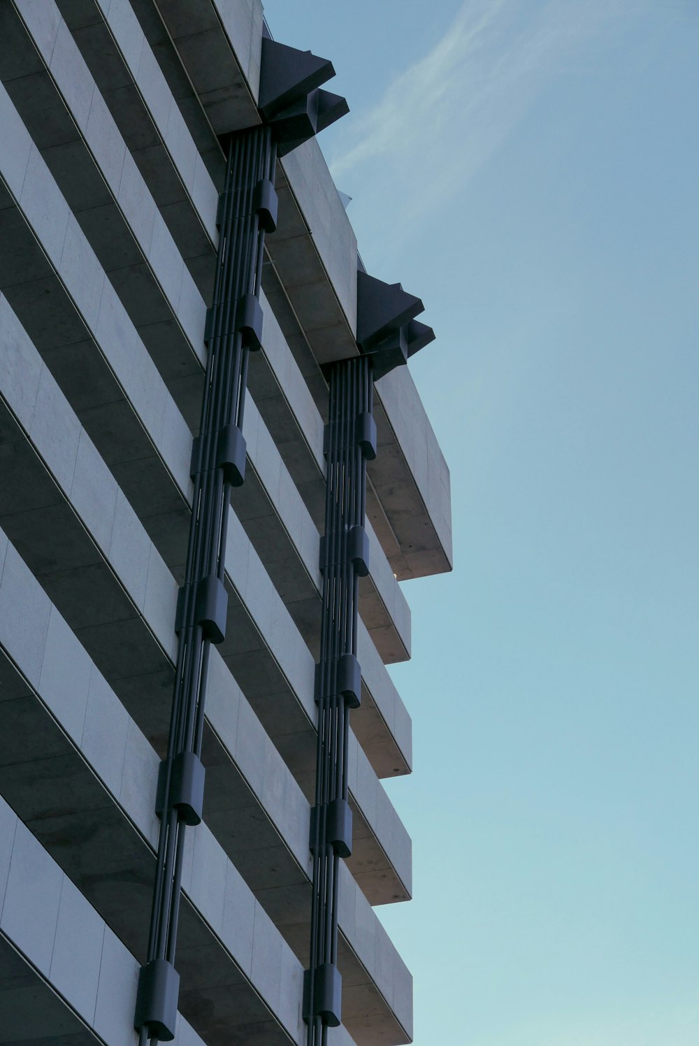 a tall building with a clock on the side of it