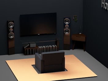 a living room with a flat screen tv and speakers