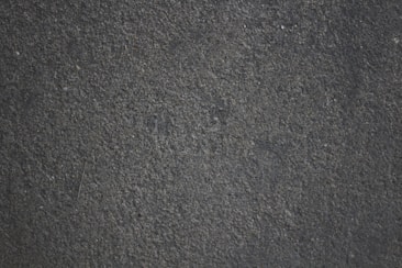 a close up of a black textured surface
