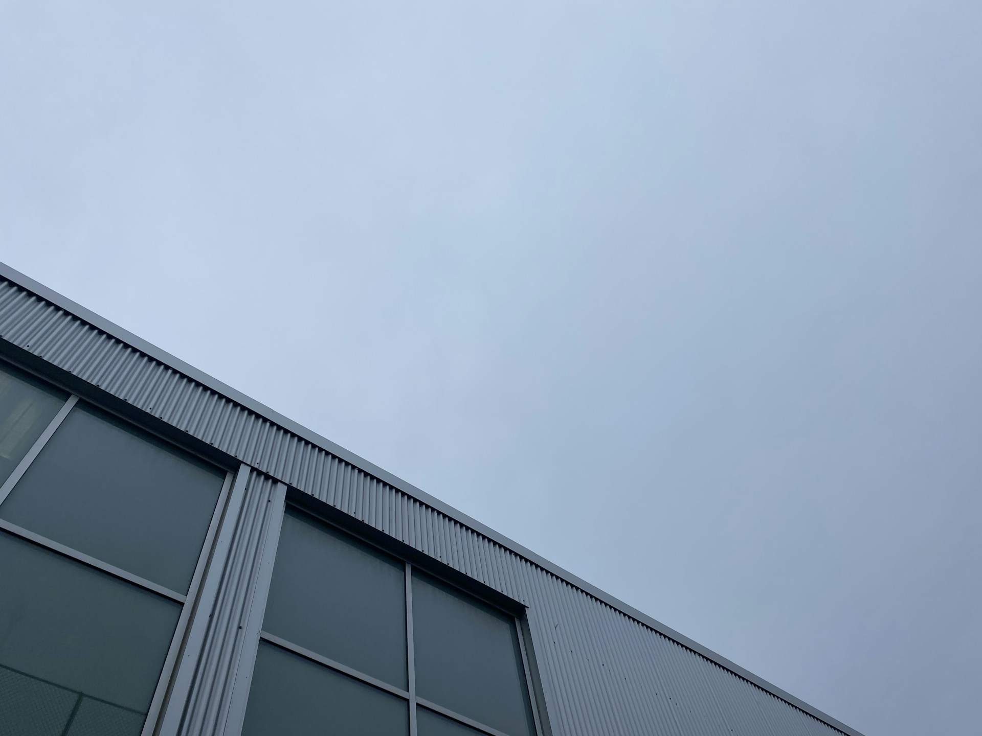 a tall building with lots of windows on top of it