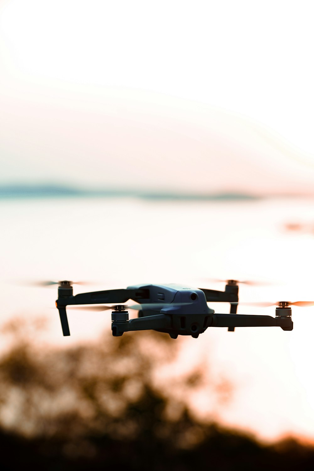 a black and white photo of a flying device