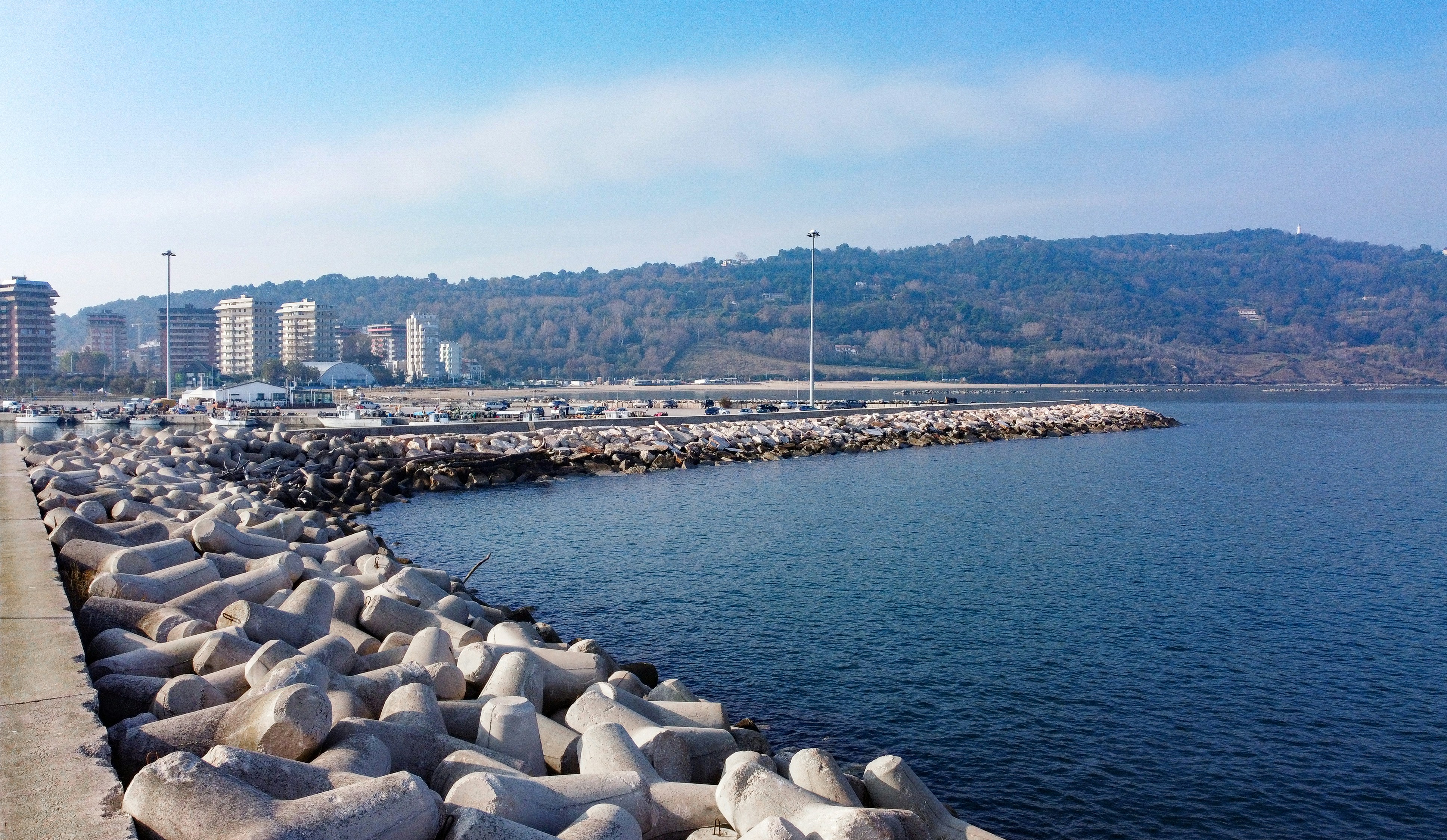 a large body of water next to a city