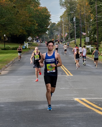 Photo of runners starting a local road race under clear skies