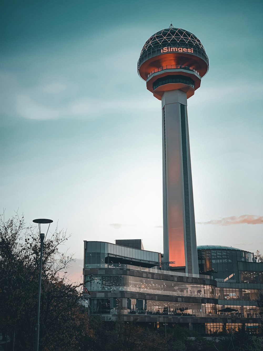 a tall tower with a light on top of it