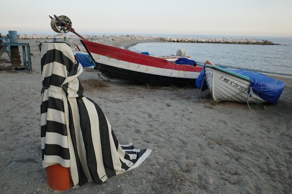 Fishing boats pulled up on the beach — Marbella, Spain