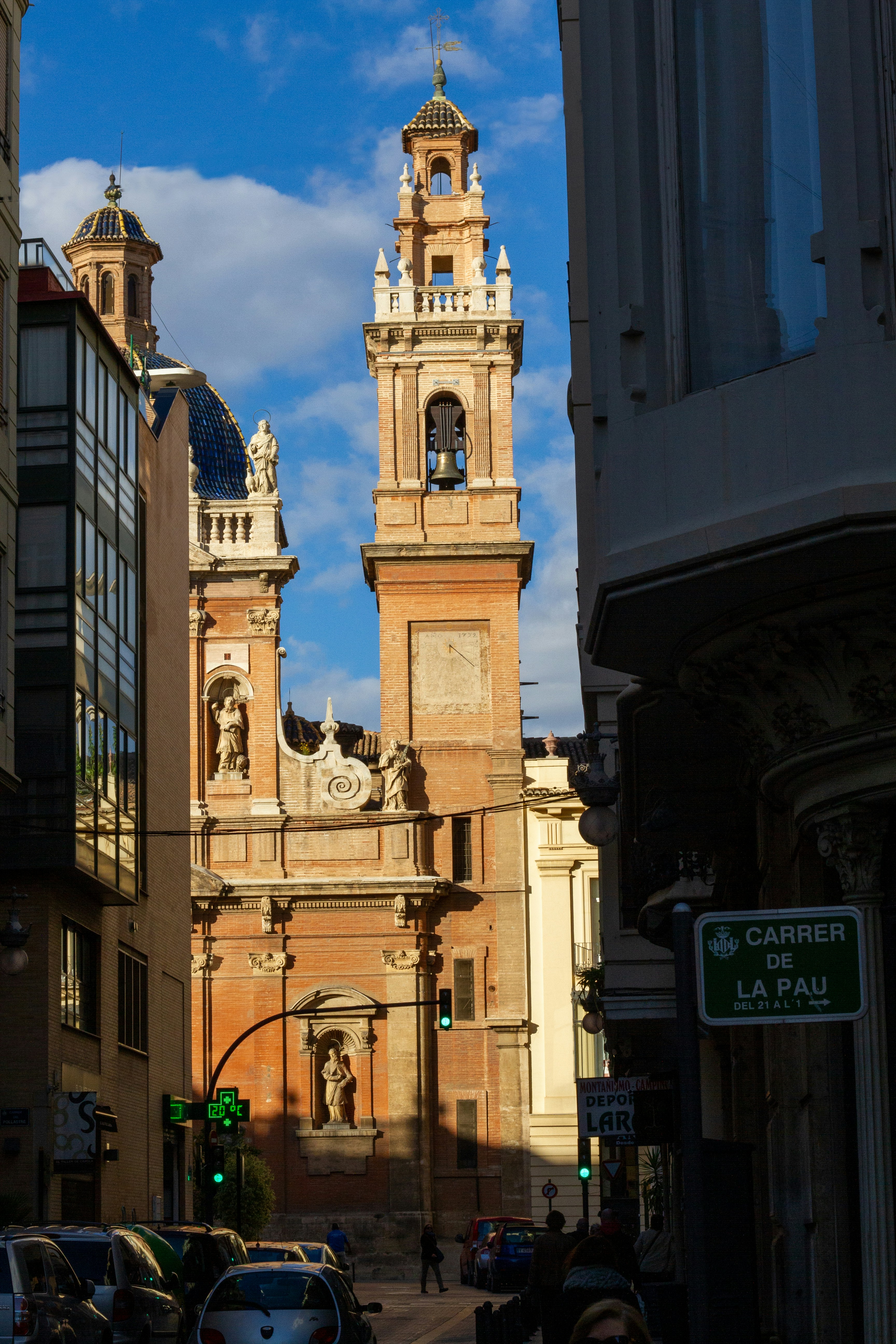 a tall building with a clock on the top of it