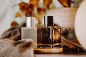 a bottle of perfume sitting on top of a table