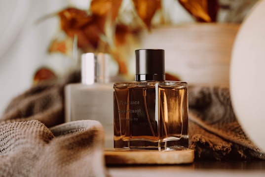 a bottle of perfume sitting on top of a table