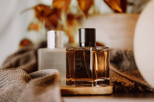 a bottle of perfume sitting on top of a table