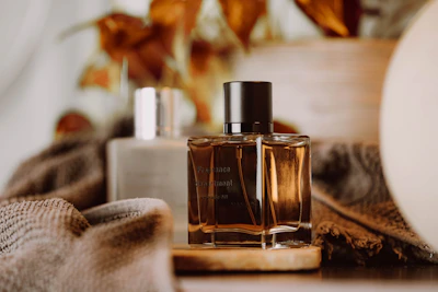 a bottle of perfume sitting on top of a table