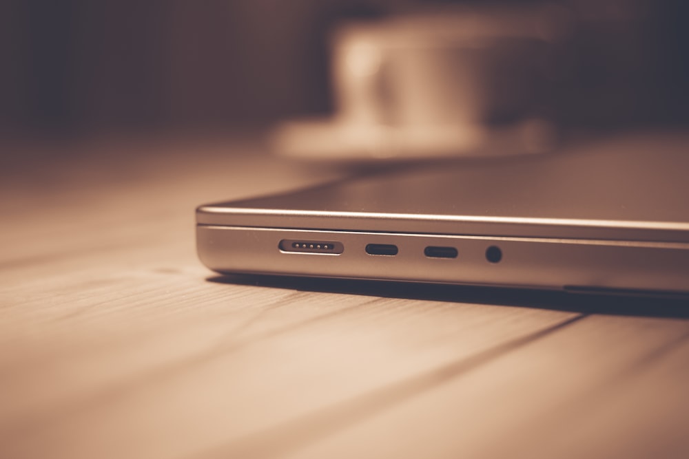 a close up of a cell phone on a table