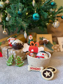 A festive scene with various gifts and decorations.