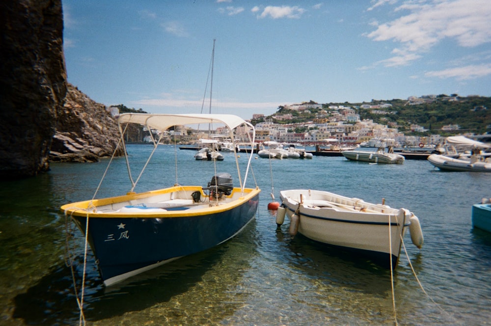 a couple of boats that are in the water