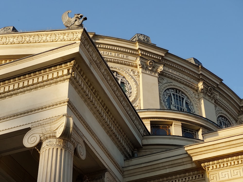 a large building with a clock on the top of it