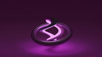 a purple and black logo on a purple background