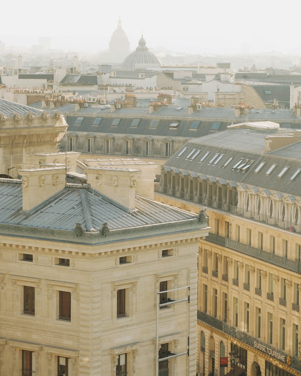 a view of a city from the top of a building