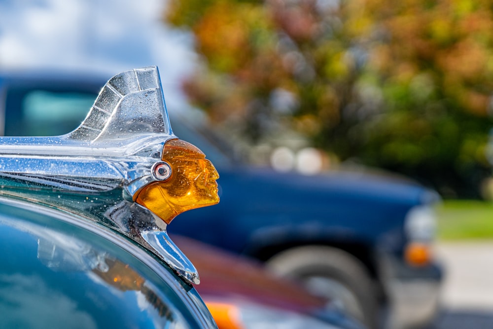 a close up of a car's hood ornament