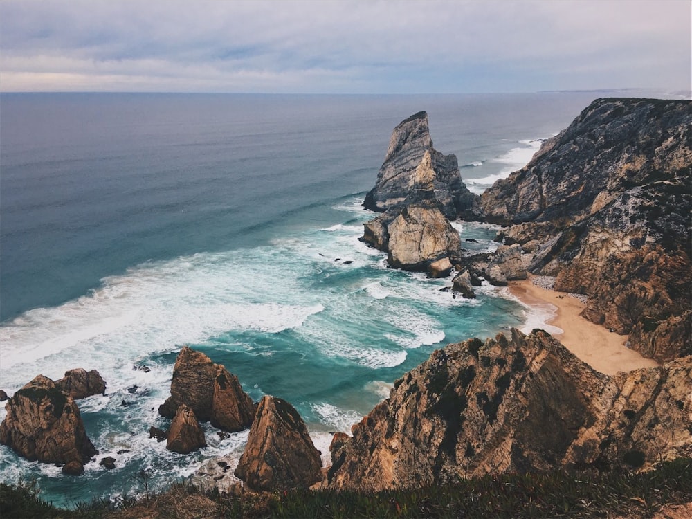 a view of the ocean from the top of a mountain