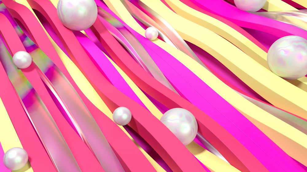 a pink and yellow background with pearls and ribbons
