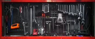 a red toolbox filled with lots of tools