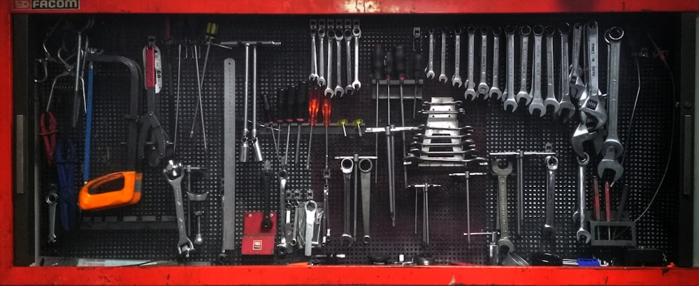 a red toolbox filled with lots of tools