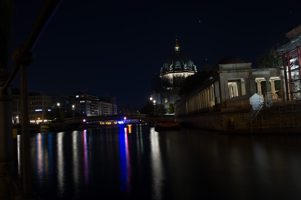 a river that has some lights on it