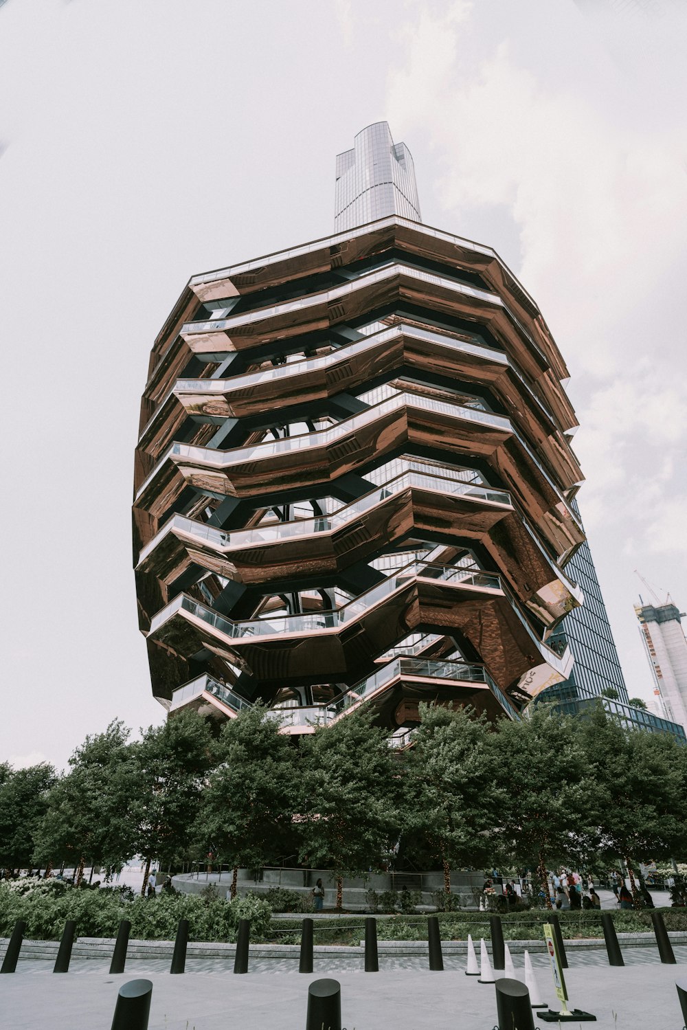 a tall building with many balconies on top of it