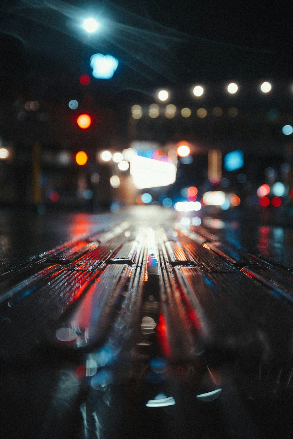 a blurry photo of a city street at night