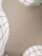 Close-up of a stretched PVC membrane ceiling with smooth, flawless surface.