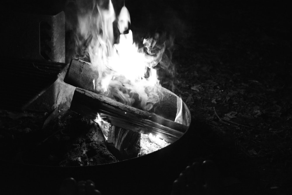 a fire burning in the middle of a forest