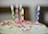 A joyful family celebrating a birthday with colorful decorations.