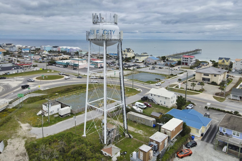 an aerial view of a city with a water tower