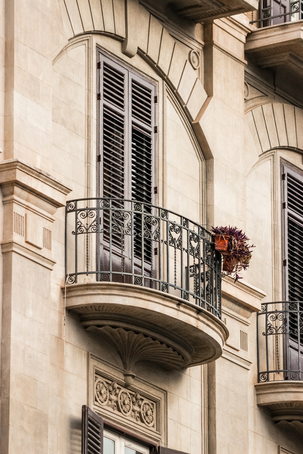 a building with a balcony and balconies on it