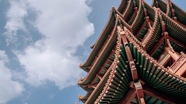 a tall building with a sky background