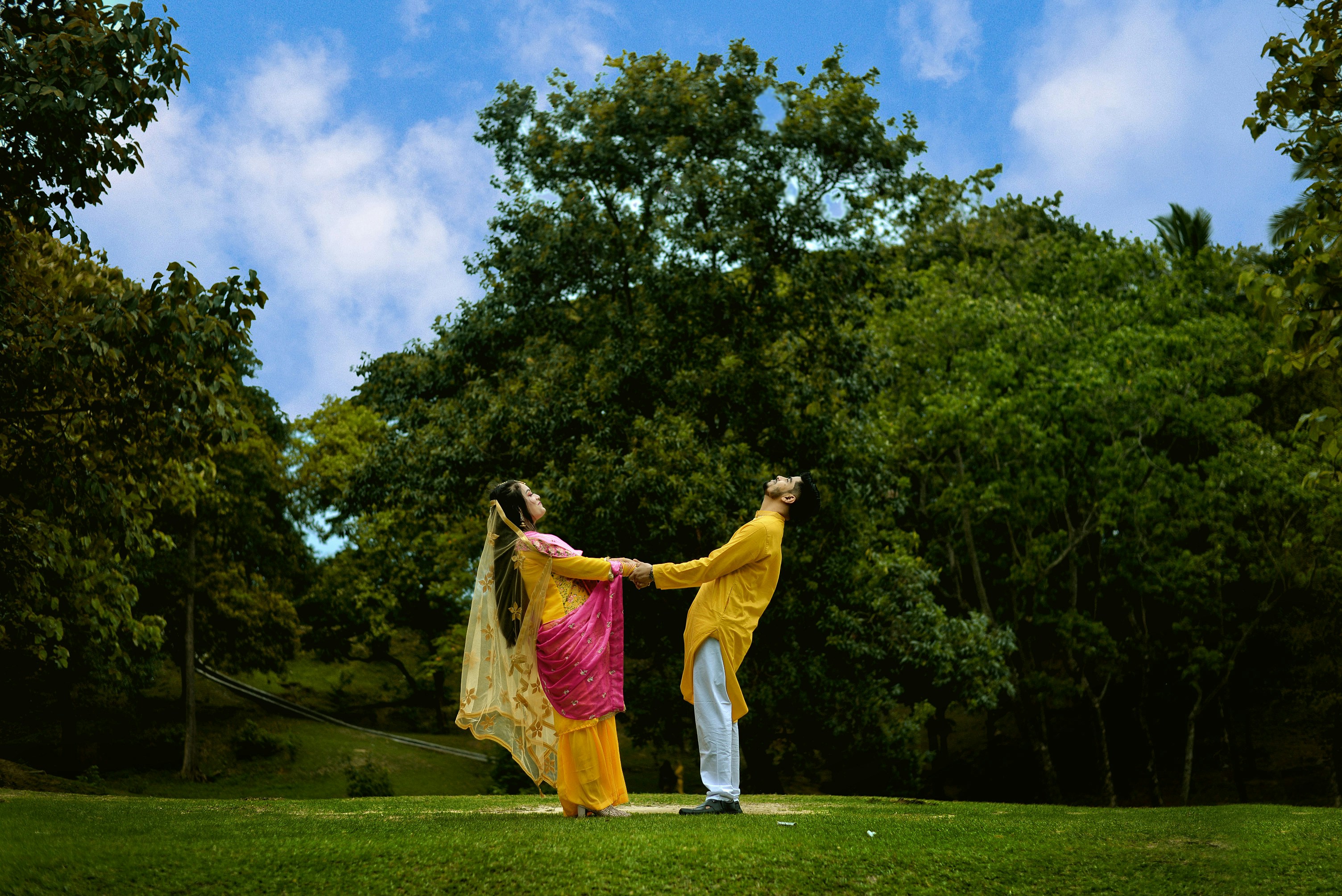 couple on green field