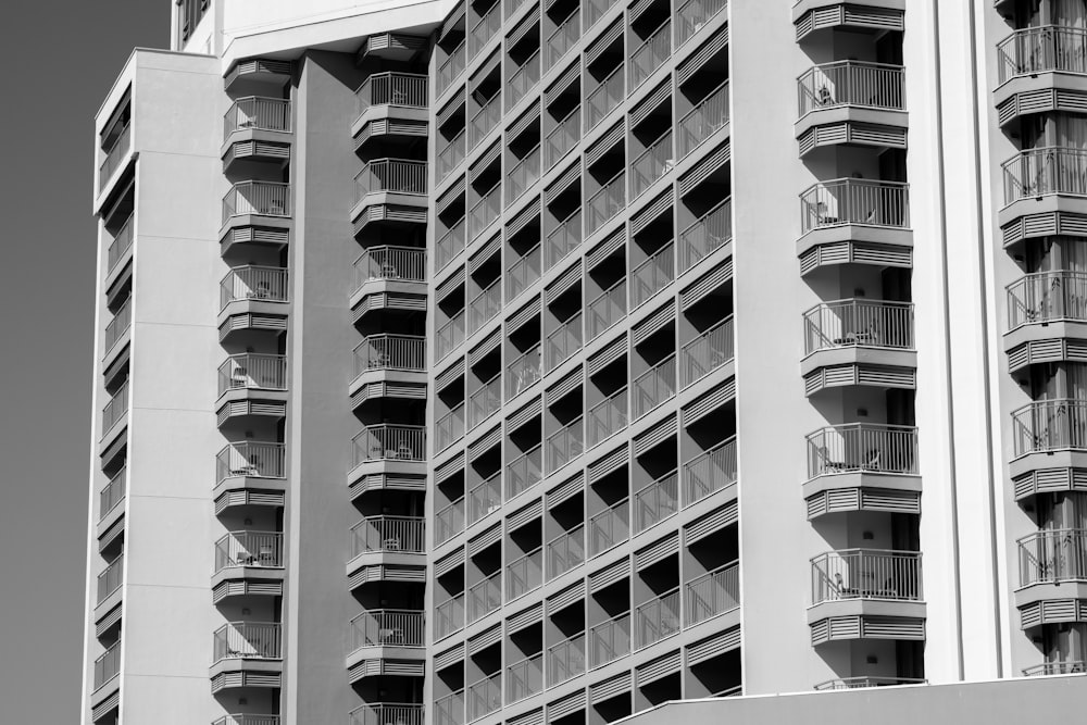 a black and white photo of a tall building