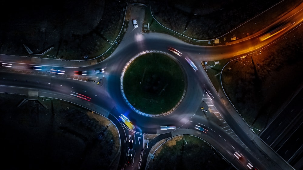 an aerial view of an intersection at night