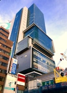Aerial shot of a construction site blending traditional and modern architecture in Tokyo.