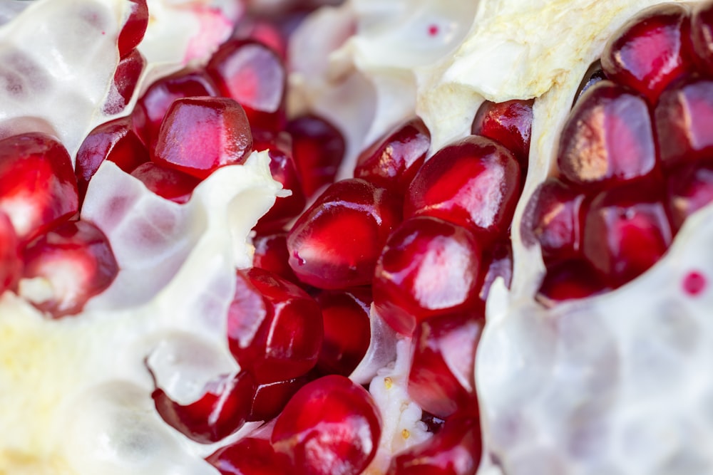 a close up of a pomegranate on a plate