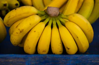 a bunch of bananas sitting on top of each other